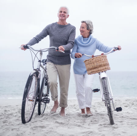 senior couple biking